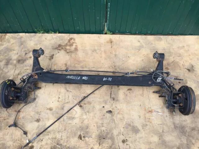 Королла е100 задняя балка. Задняя подвеска тойота королла 120 кузов. Задняя балка тойота королла 120. Задняя балка тойота королла 120 кузов. Задняя балка м королла 141 кузов.