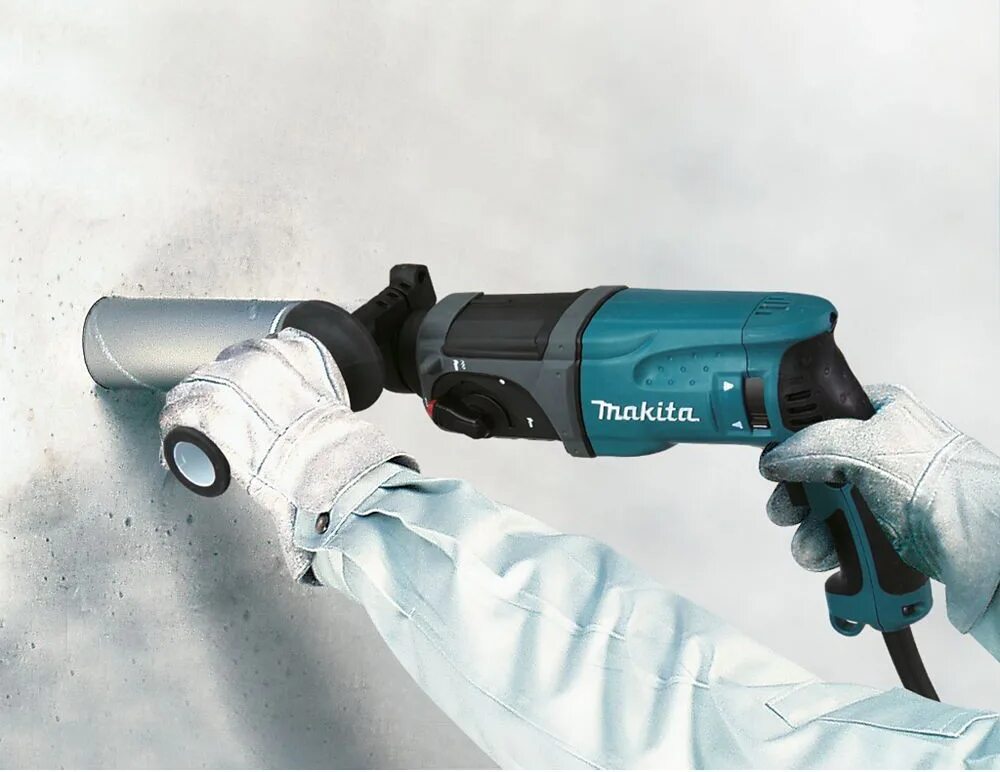 Перфоратор 2470 цена. Перфоратор Makita hr2470. Пылеудалитель НМ перфоратор Макита. Перфоратор Makita HR 2653 С системой пылеудаления. Перфоратор с системой пылеудаления Makita hr2653 изнутри.