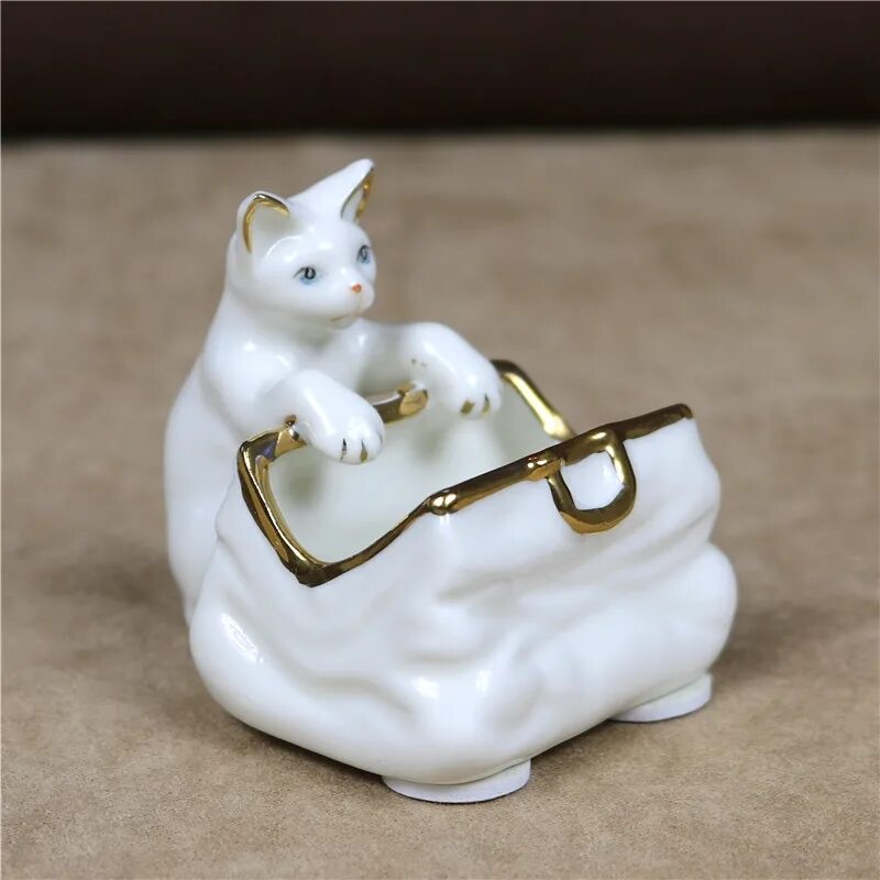 Керамическая кошка купить. Керамическая кошка статуэтка. Фигурка котенка керамика. Керамические кошки. Миниатюрная керамическая кошка.