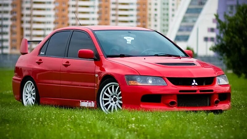 Mitsubishi lancer 9 кузов. Мицубиси Эво 9. Митсубиси Лансер Эволюшн 9. Митсубиси Лансер 9 красный Эво. Митсубиси Лансер Эволюшн 1.