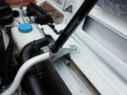 Газовые упоры нива 2121