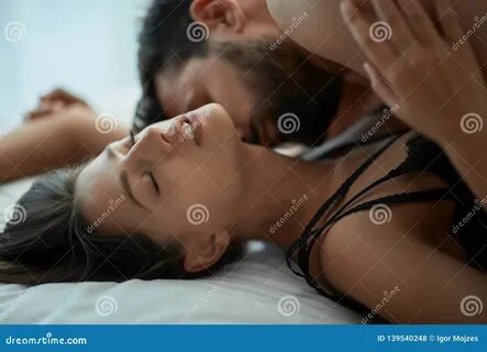 Blogger. https://www.dreamstime.com/young-couple-making-love-having-passion...