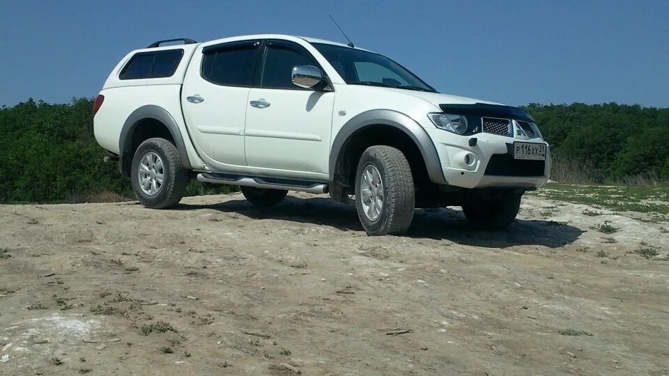 Mitsubishi l200 2011. Митсубиси л200 2011. Mitsubishi l200 2011 год. Мицубиси l200 2.5 di-d 4wd at. Привод l200.