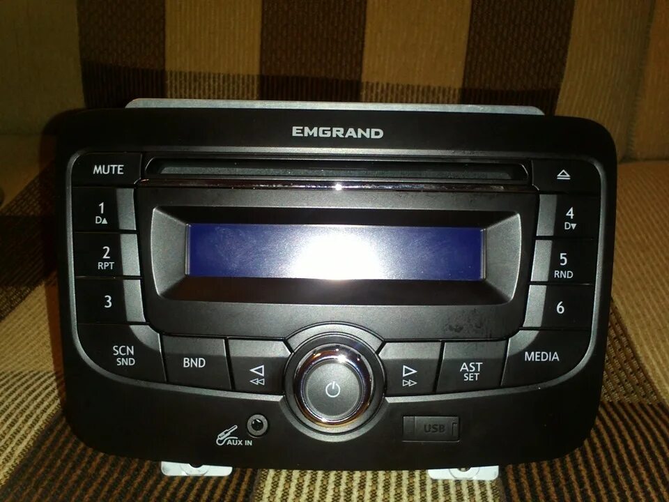 Штатные магнитолы geely. Штатная магнитола geely emgrand ec7. штатная магнитола geely emgrand 7. штатная аудиосистема geely emgrand 7. geely emgrand ec7 2014 магнитола.