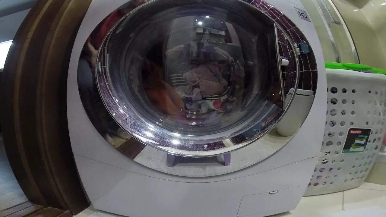 Показать стиральную машину lg видео