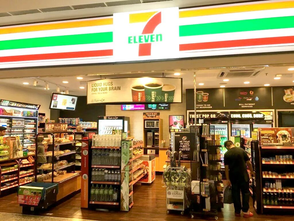 Магазин севен элевен. 7-11 Севен Элевен. 7 Элевен магазин. Seven Eleven сеть. 7 Eleven США.