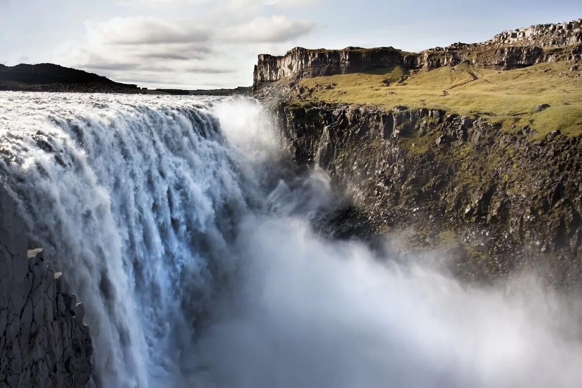 Водопад Dettifoss, Исландия. Исландский водопад Деттифосс. Водопад Деттифосс (Dettifoss),. Деттифосс-самый большой водопад в Европе. Большой водопад в европе