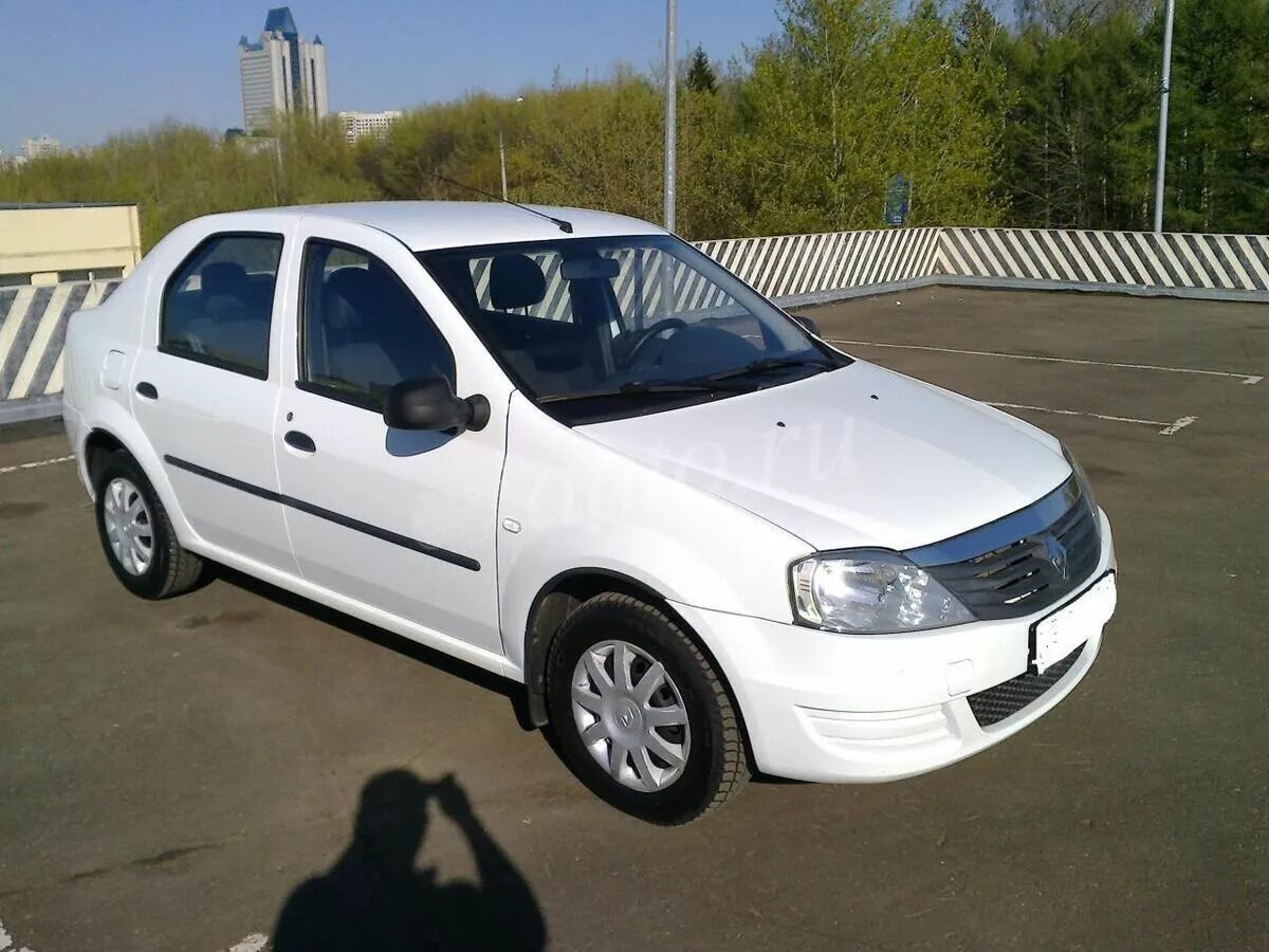 Рено логан на авито авто до 650000. Рено Логан 1.4 2012. Renault Logan 2012 1.4. Рено Логан 1 Рестайлинг. Рено Логан 2012г белый.