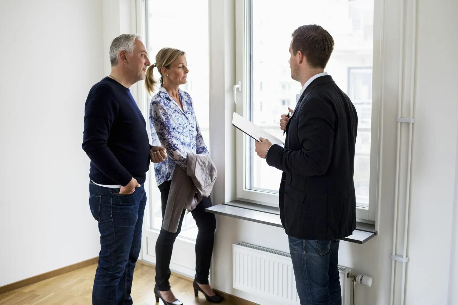 Listing agent. Sara and her real Estate agent. Sell photos.