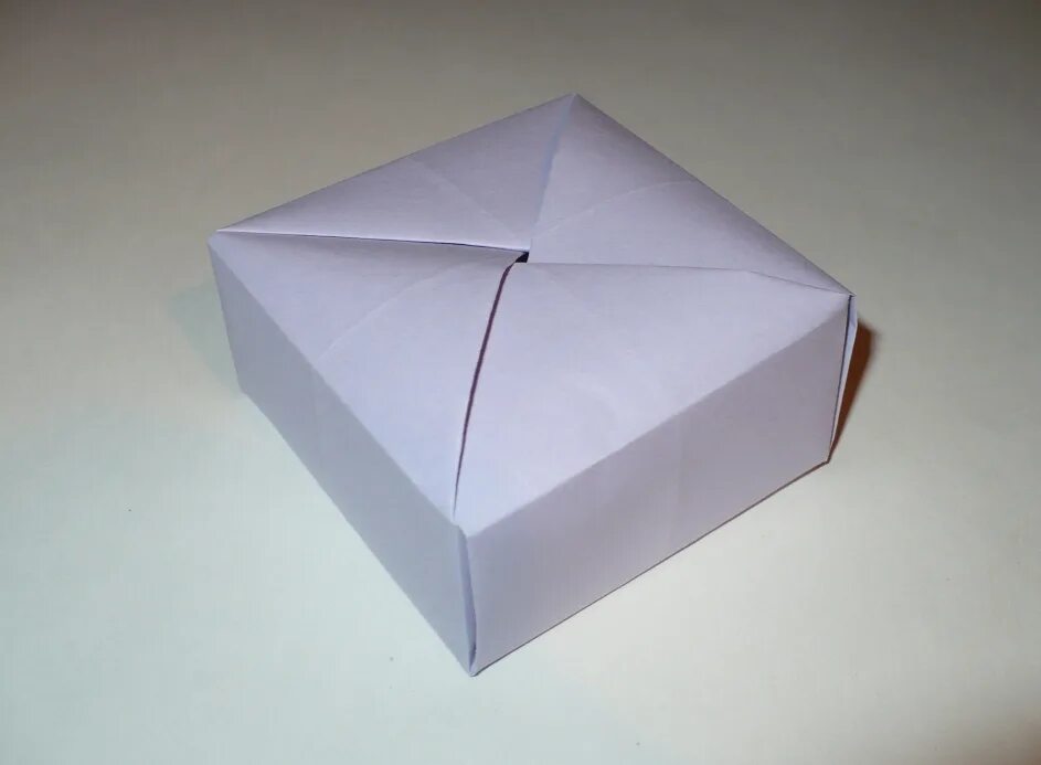Сделать коробочку из бумаги без клея. Коробочка из а4. Коробочка из бумаги. Коробочка из листка бумаги. Коробка из листа бумаги а4.