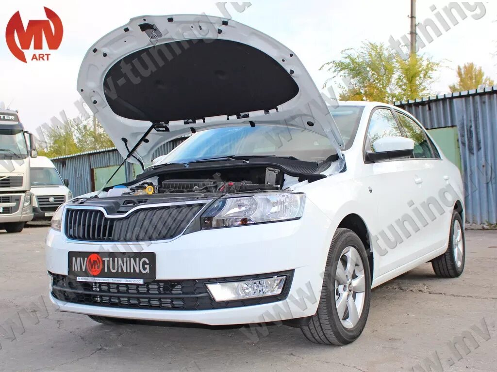 Куплю капот шкода рапид. Капот Рапид 2016. Капот Skoda Rapid. Капот Шкода Рапид 2017. Упор капота Шкода Рапид.