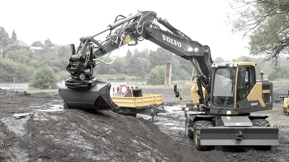 Volvo EW 160e Excavator. Volvo ew160. Volvo ew205d. Volvo 160 экскаватор. Колесный экскаватор вольво