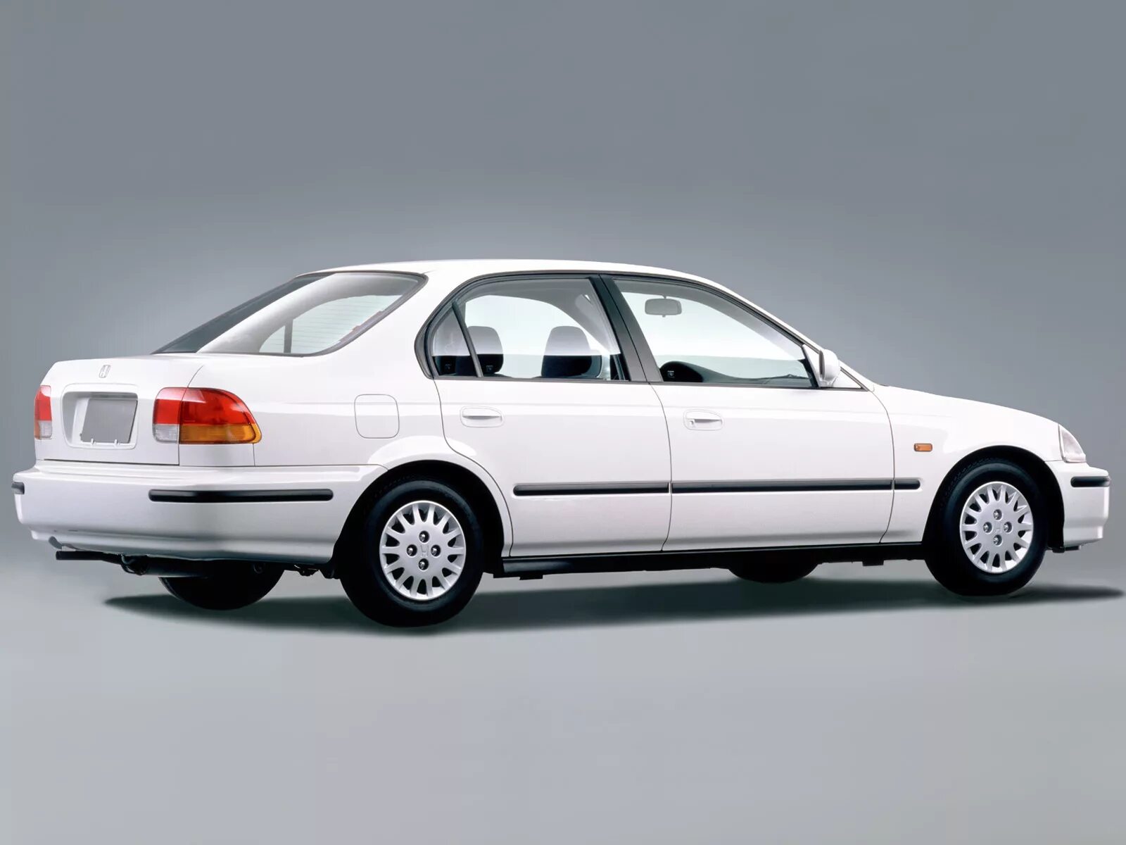 Honda 6 поколения. Honda Civic 6 поколение седан. Honda Civic Ferio 5 поколение. Honda Civic Ferio 2000. Honda Civic 2000 седан.