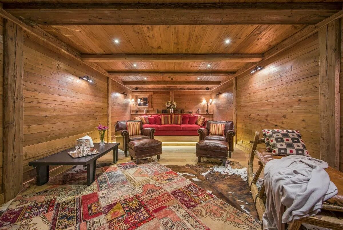 Стиль русской избы. Интреьер в руском стиле. Интерьер в деревенском стиле с печкой. Старорусский стиль в интерьере. Современный русский стиль в интерьере.