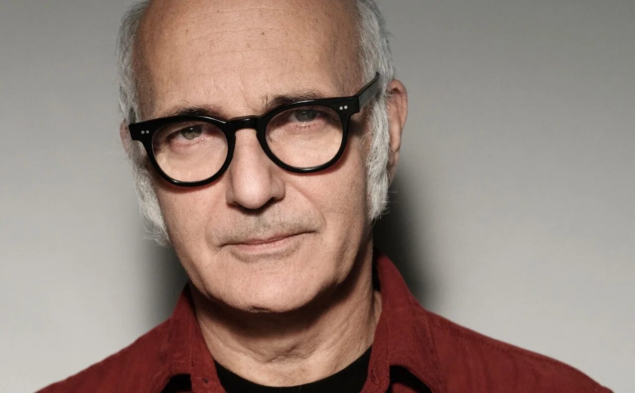 Итальянский пианист людовико эйнауди. Людовико эйнауди концерт в москве 2021. Людовико эйнауди в молодости. Оперы людовико эйнауди. Людовико эйнауди фото.