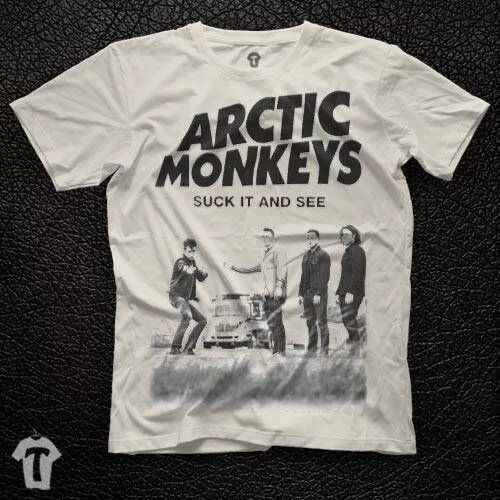 Как переводится suck. Arctic Monkeys футболка. Arctic Monkeys suck it and see. Футболка серая Arctic Monkeys. Футболка Arctic Monkeys crying Lightning.