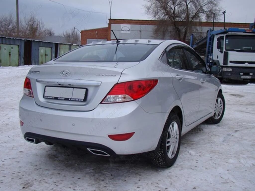 Диффузор хендай солярис. Hyundai solaris 1 2010 - 2016. диффузор заднего бампера hyundai solaris. диффузор солярис 1. диффузор заднего бампера солярис 2016.