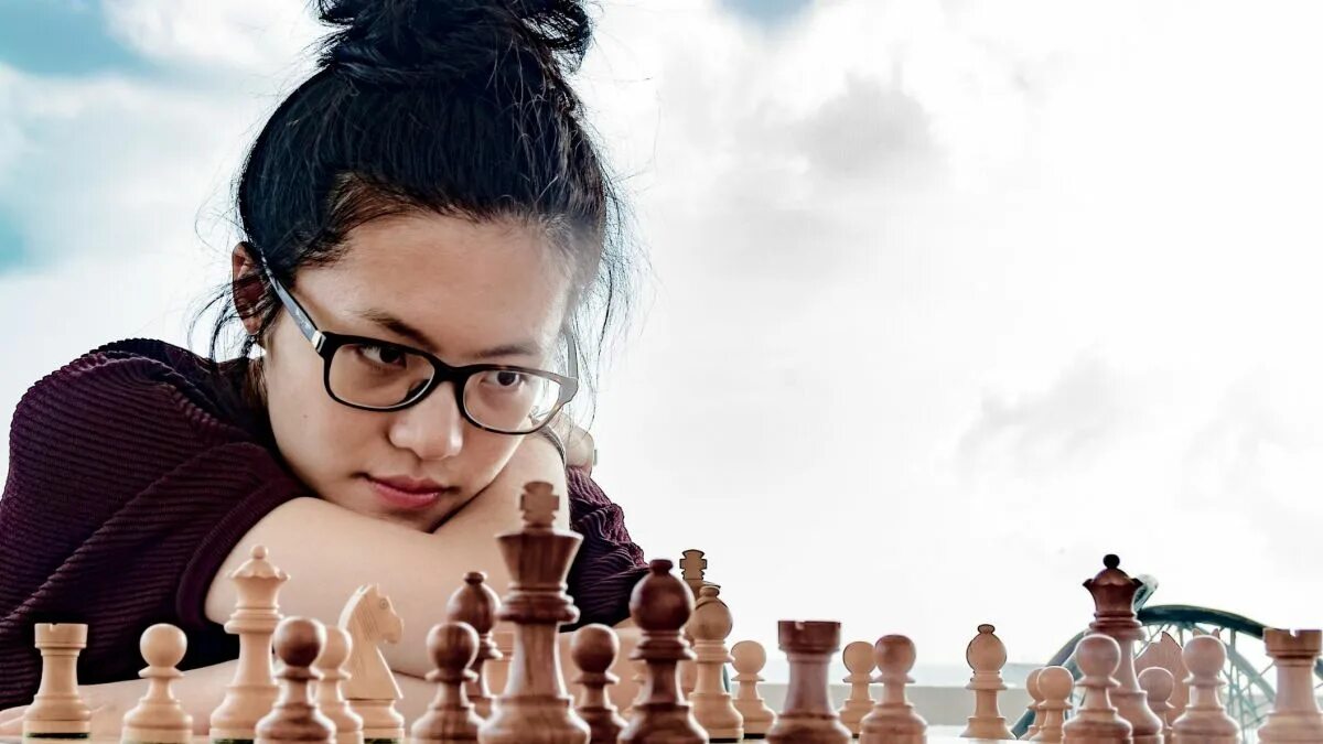 She playing chess