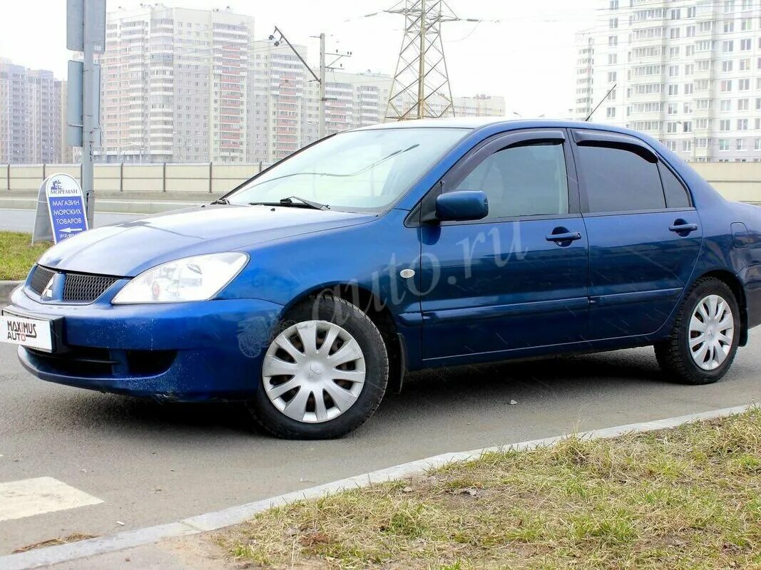 Митсубиси Лансер 2006 синий. Lancer 9 синий. Митсубиси Лансер 9 синий. Mitsubishi Lancer 9 Caspian Blue.