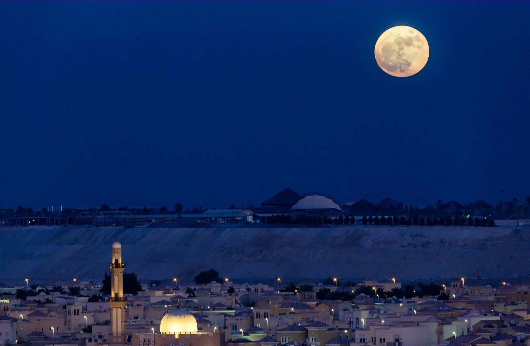 Super moon and lunar eclipse combine for 'blood moon' - pictures from around the