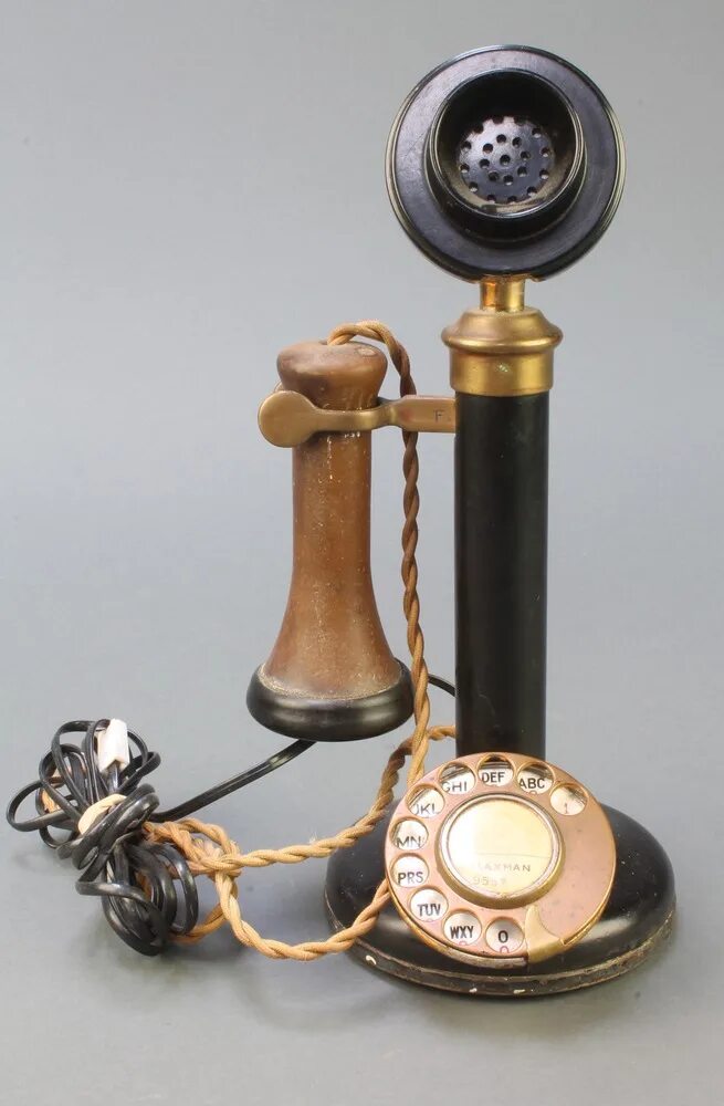 Телефон подсвечник. История телефона. Телефон канделябр. Candlestick telephone.