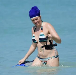 Meredith Ostrom in Bikini on holiday in Barbados. 