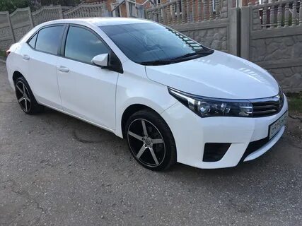 Королла е160