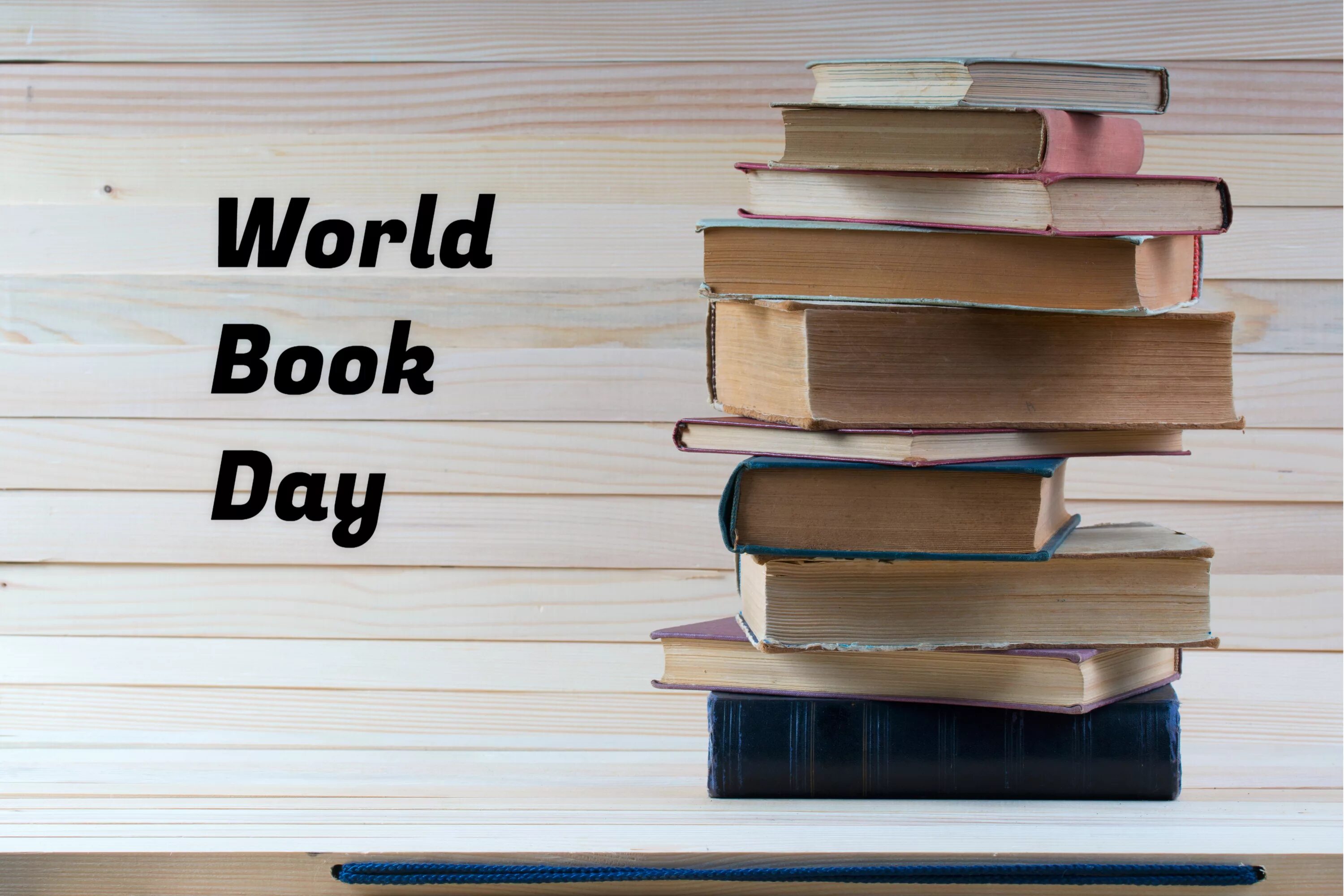 World book Day. When is World book Day. Book Day 2023. Книга на деревянном столе. When day book