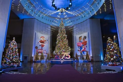 Walking around christmas tree