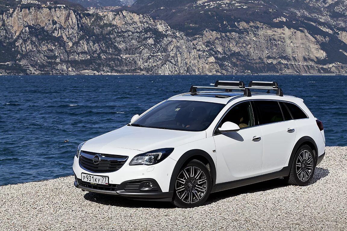 Country touring. Opel Insignia Country Tourer 2013. Opel Insignia Country Tourer 2020 багажник. Opel Insignia Country Tourer 2014. Опель Инсигния универсал.