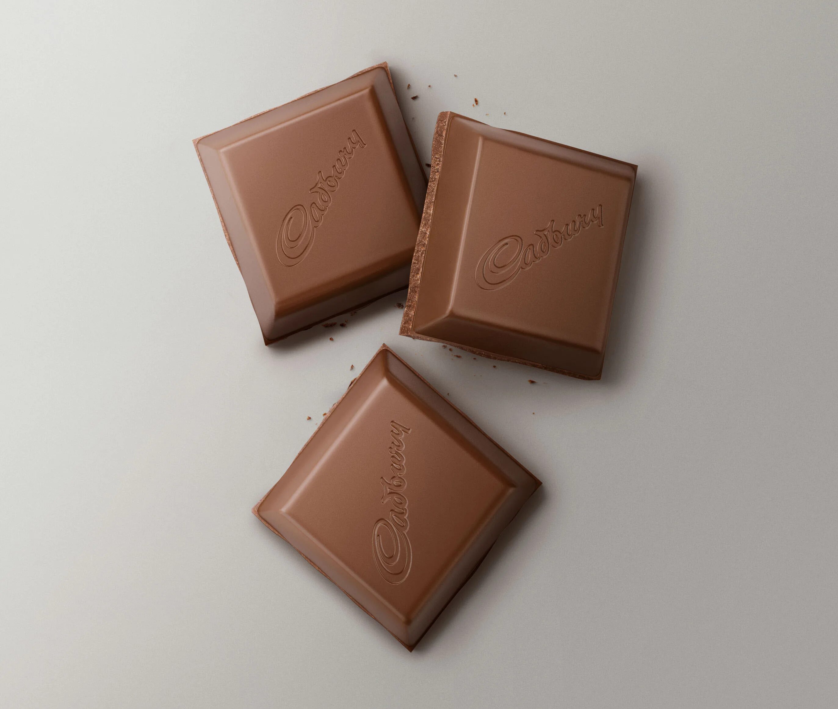 Шоколад квадрат. Шоколад квадратный. Квадратные шоколадки. Долька шоколада. Шоколадка прямоугольная.