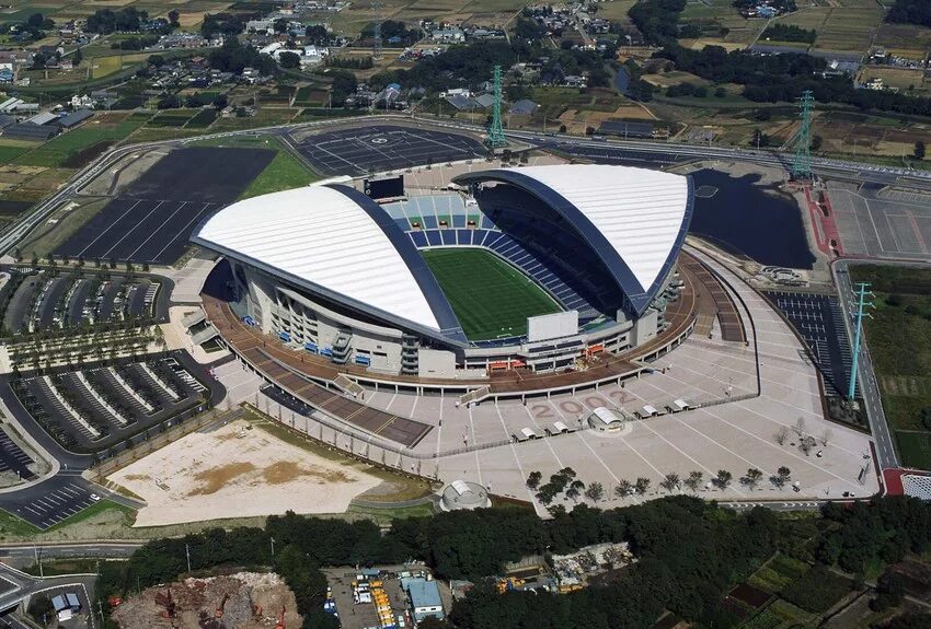 Стадион это объект. Олимпийский стадион Токио 2020. Стадион Сайтама Япония 2002. Олимпийские объекты в Токио 2020. Стадионы ЧМ 2002 Япония.
