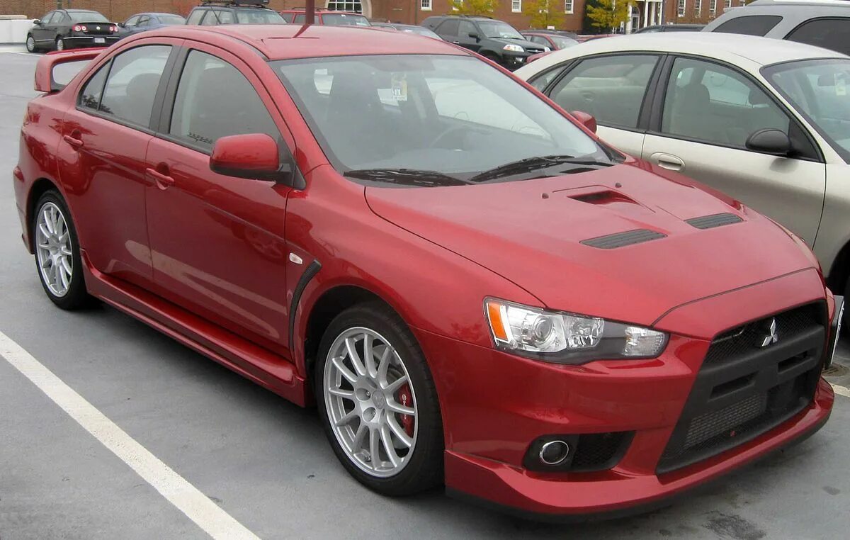 Lancer 10 2008 год. Mitsubishi Lancer Evolution 10. Митсубиси Лансер 10 EVO. Мицубиси Лансер Эволюшн 2008. Lancer Evolution x 2008.