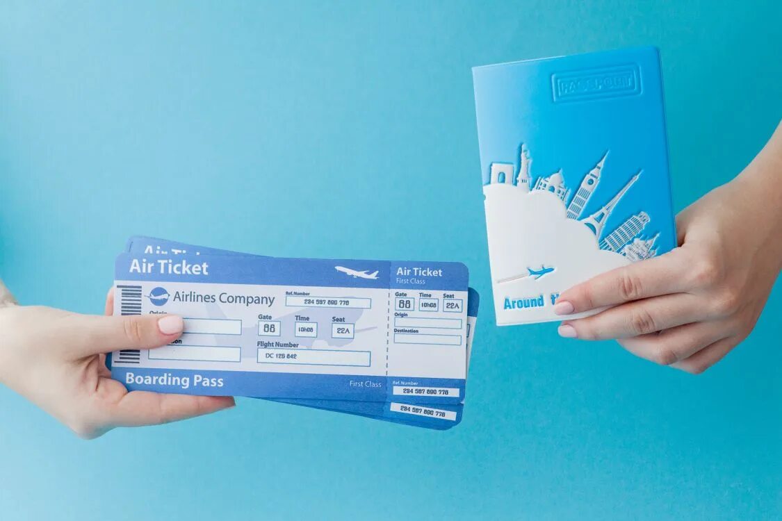 Here are your tickets. Билеты и паспорт в руке. Паспорт и билет на самолет. Авиабилеты в руках. Авиабилет в паспорте в руках.