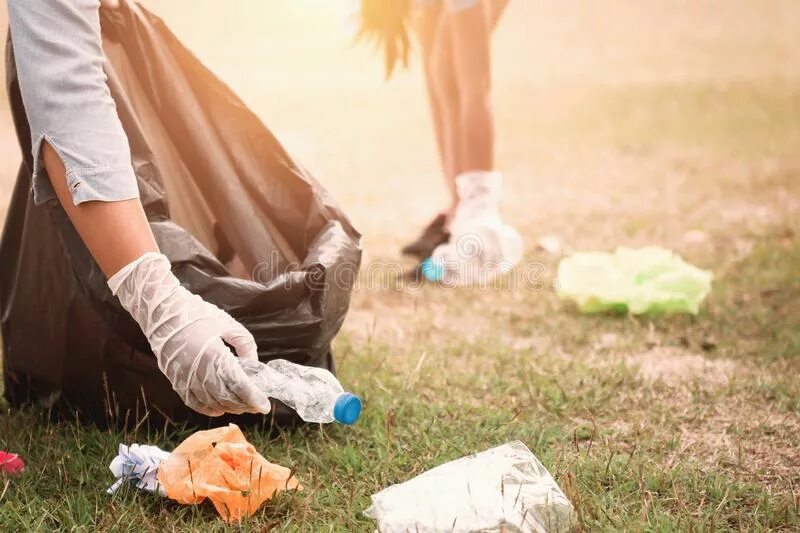 Picking up women. Pick up Garbage. Pick up Litter. Cleaning Garbage. Clean up Garbage in nature.