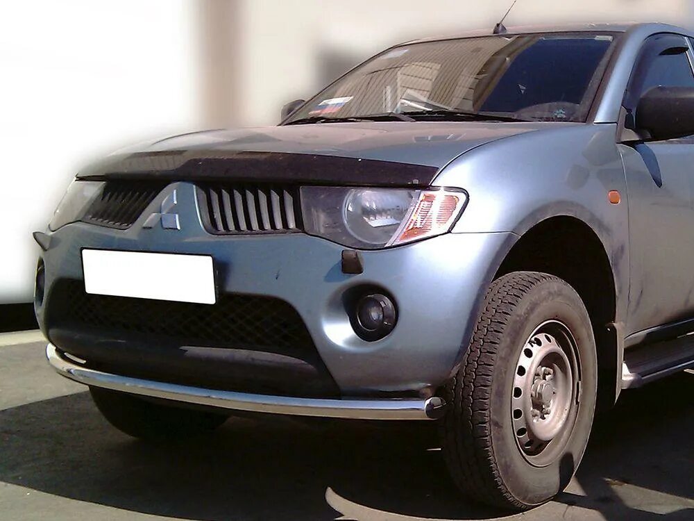 Защита бампера Mitsubishi l200 v. Mitsubishi l200 защита переднего бампера. Защита переднего бампера Митсубиси л200. Передняя защите бампера Мицубиси л200. Бампер л200 купить