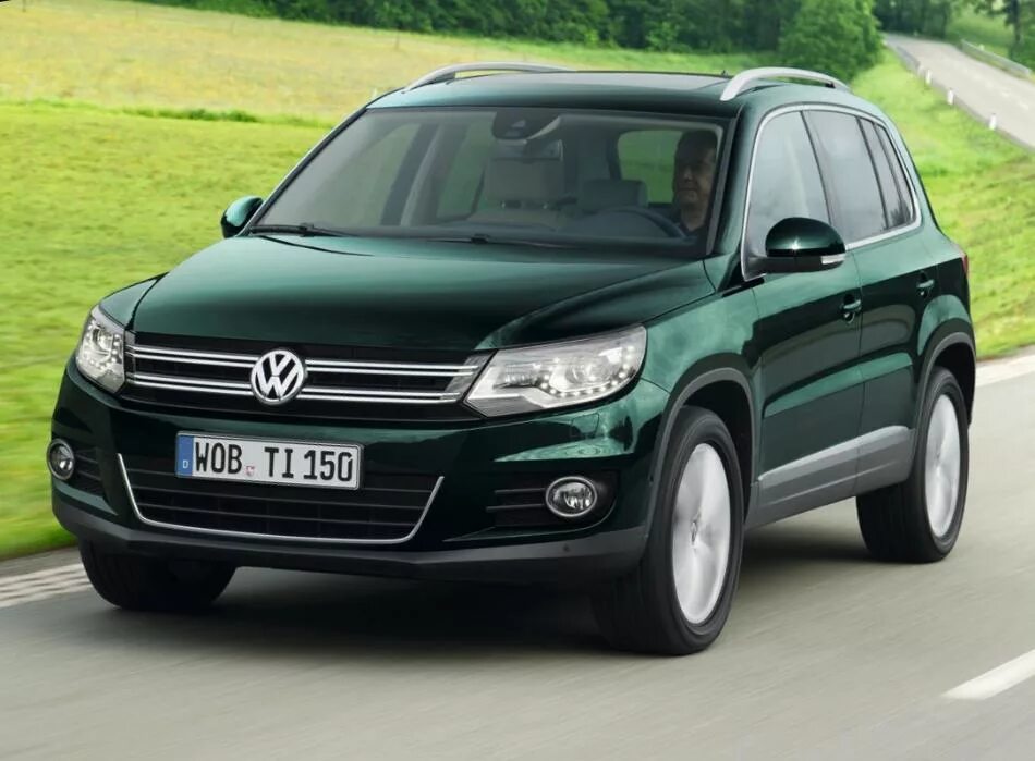 Volkswagen tiguan 2014. Фольксваген Тигуан. VW Tiguan 2014. Машина Volkswagen Тигуан. Фольксваген Тигуан 2014 года.