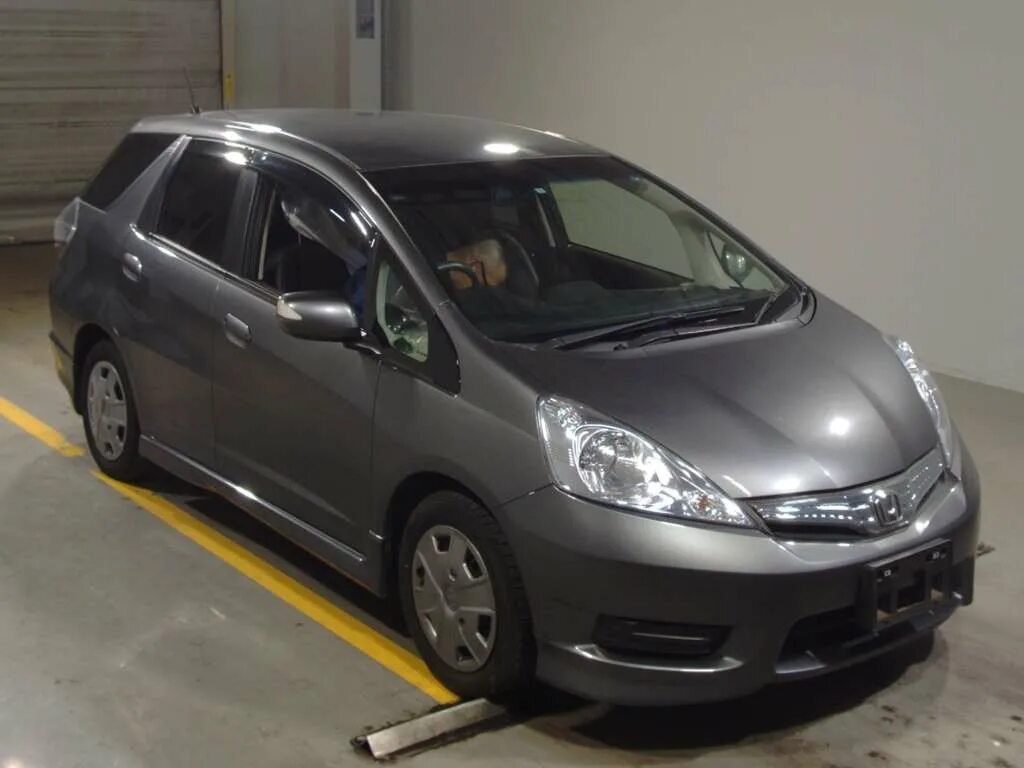 Фит шаттл 2011 год. Honda Fit Shuttle 2011. Honda Fit Shuttle 2012. Honda Fit Shuttle Hybrid 2011. Honda Fit Shuttle Hybrid.