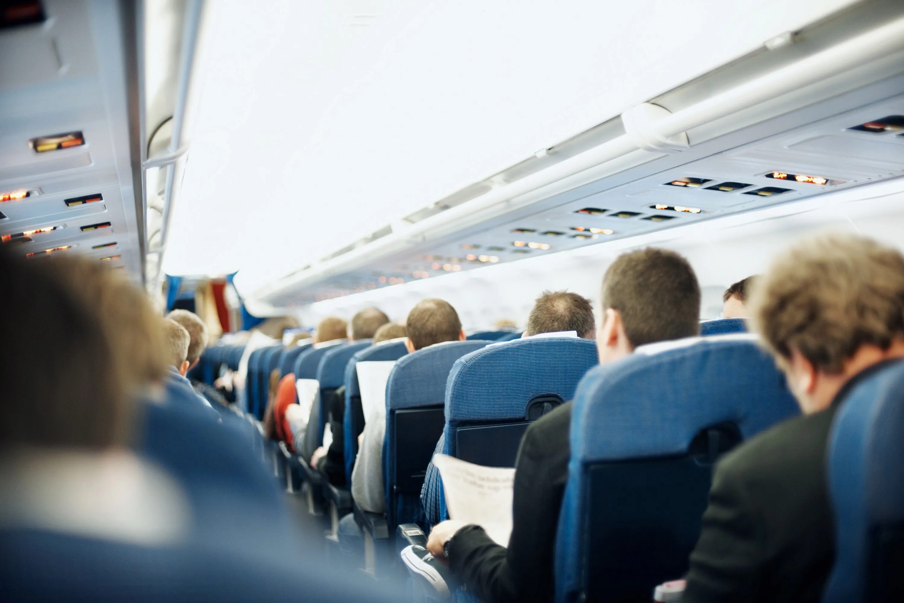 Места у прохода в самолете. Проход в самолете. aisle seat. aisle seat passenger. aisle airplane.