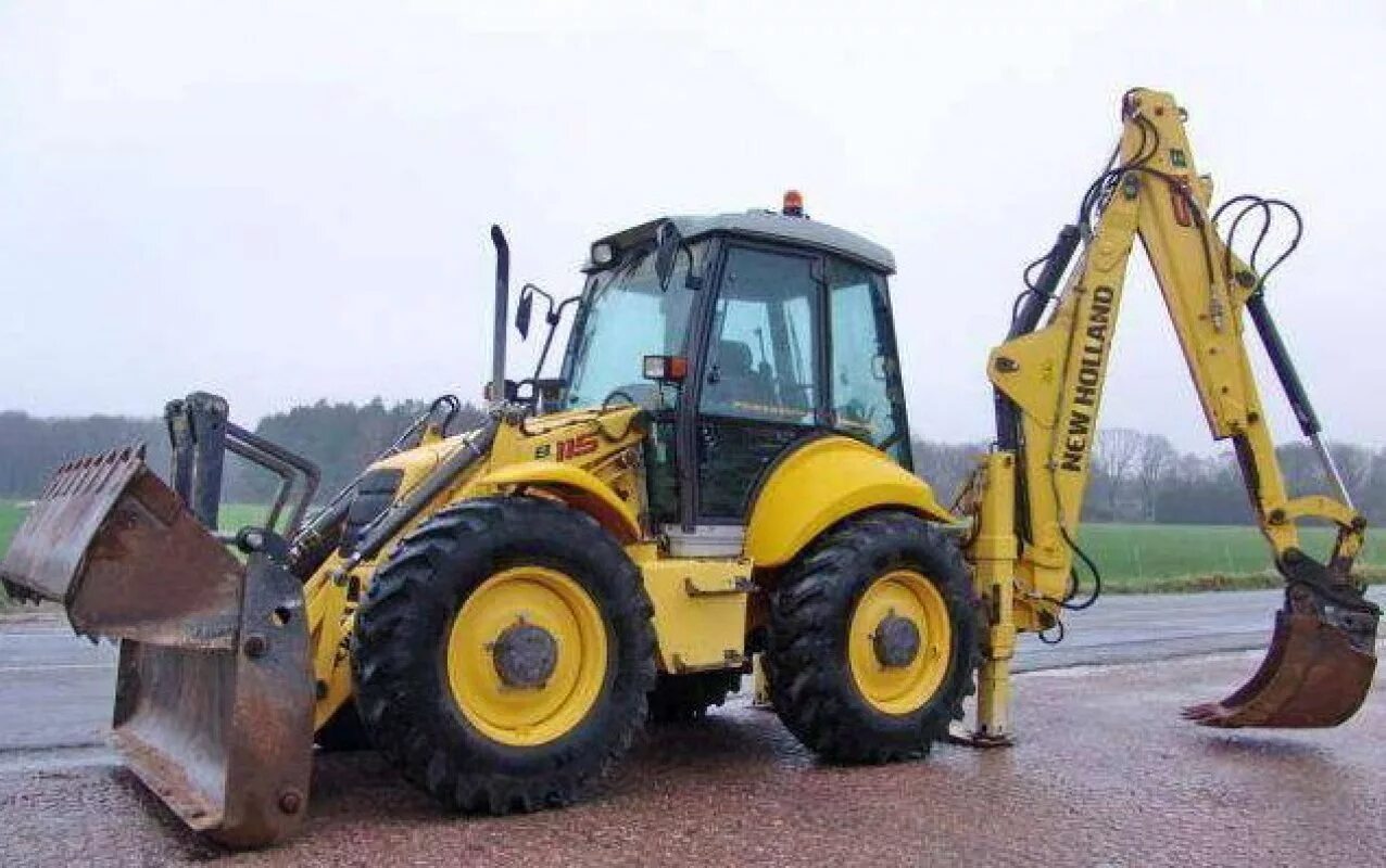 5 b 115. Погрузчик Нью Холланд 115. Погрузчик New Holland b115b. Нев Холланд экскаватор погрузчик 115. New Holland b115b 2020.