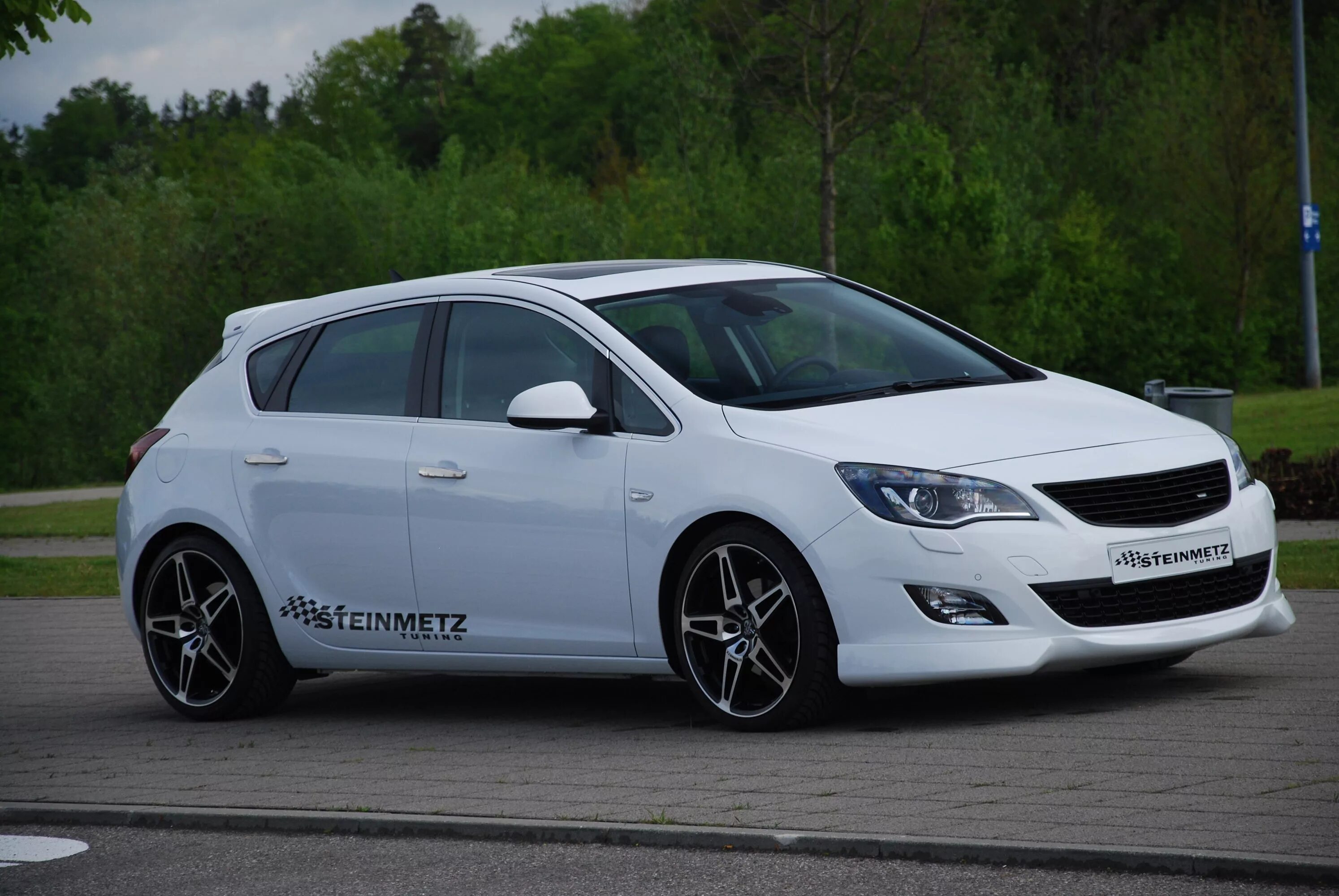 Тюнинг опель j. Opel Astra j Steinmetz. Opel Astra j Tuning. Opel Astra j тюнинговые.