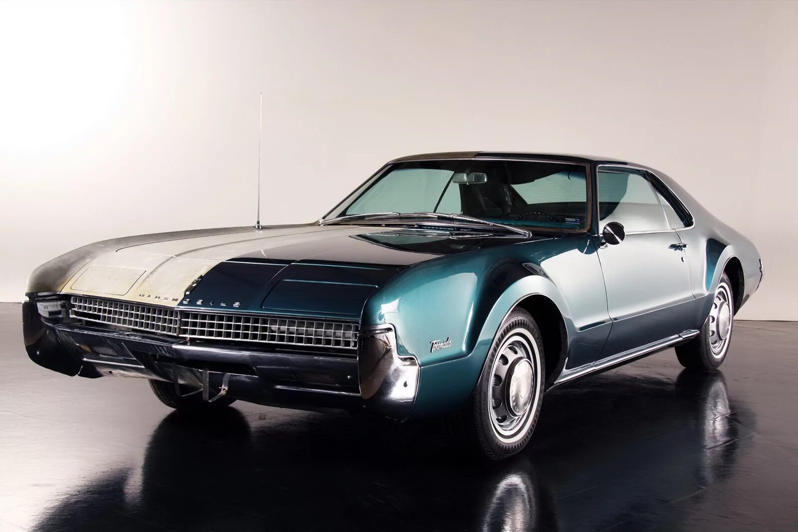 Oldsmobile Toronado 1967. Олдсмобиль купе 1967. Олдсмобиль Торнадо 1966. Олдсмобиль купе 80х. Oldsmobile toronado