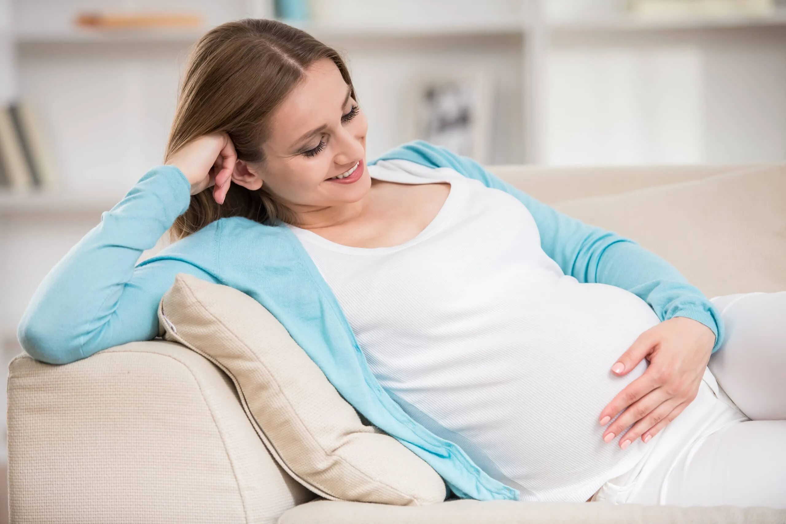 Woman is pregnant. Беременность. Беременна женщина. Будущая мама. Легкая беременность.