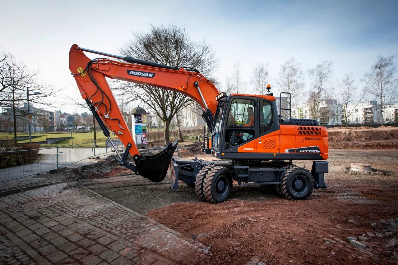 Doosan dx190w. Экскаватор Doosan 190wa. Колесный экскаватор Доосан 190. Колёсный экскаватор Doosan dx140w.