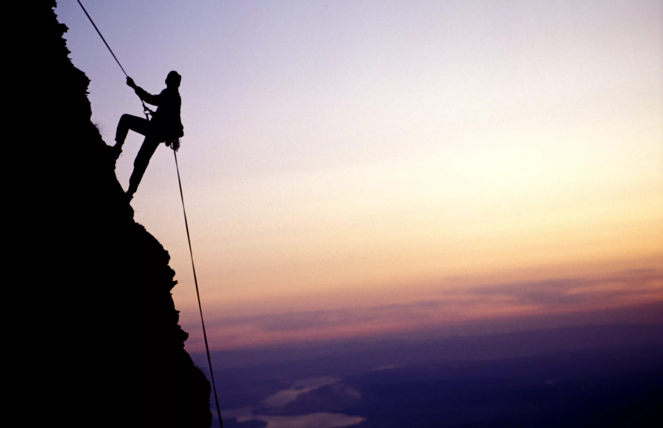 Climb up high. Подъем в гору. Человек лезет в гору. Человек карабкается в гору. Человек взбирается на гору.