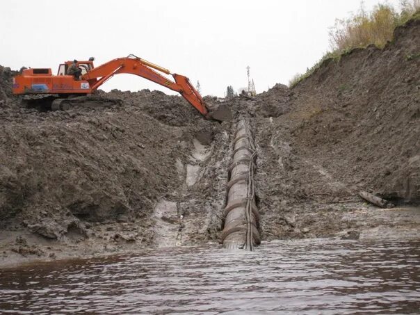 Прокладка нефтепровода через водные преграды. Подводный переход магистрального нефтепровода. Газопровод через реку. Жб дюкер. Прокладки нефтепровода через реку.