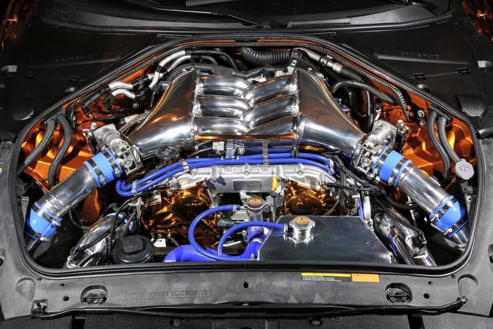 Доработка двигателя. Двигатель Ниссан ГТР 35. Мотор GTR r35. Двигатель Nissan GTR r35. Подкапотка Nissan GTR r35.