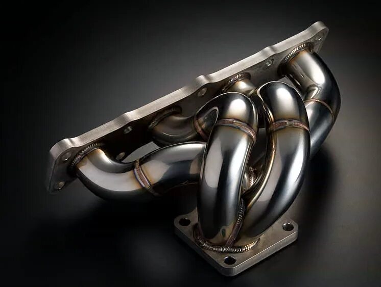 Выпускной коллектор mitsubishi. Выпускной коллектор Mitsubishi Evolution. Mitsubishi Exhaust Manifold. Выпускной коллектор Эво 9. Mitsubishi Lancer Evolution выпускной коллектор.