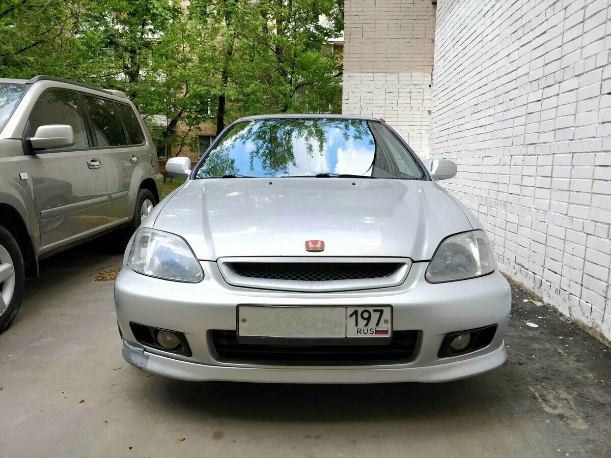 Honda civic 2000 года. Хонда Цивик 2000 года. Honda Civic серебристая. Honda Civic v серебристый металлик седан. Машина серебристый Сивик.