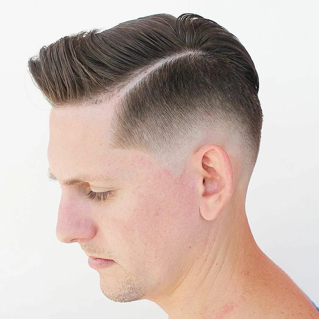 Low taper fade. Лоу фейд. Лоу фейд стрижка. Лоу фейд стрижка мужская. Скин фейд стрижка.